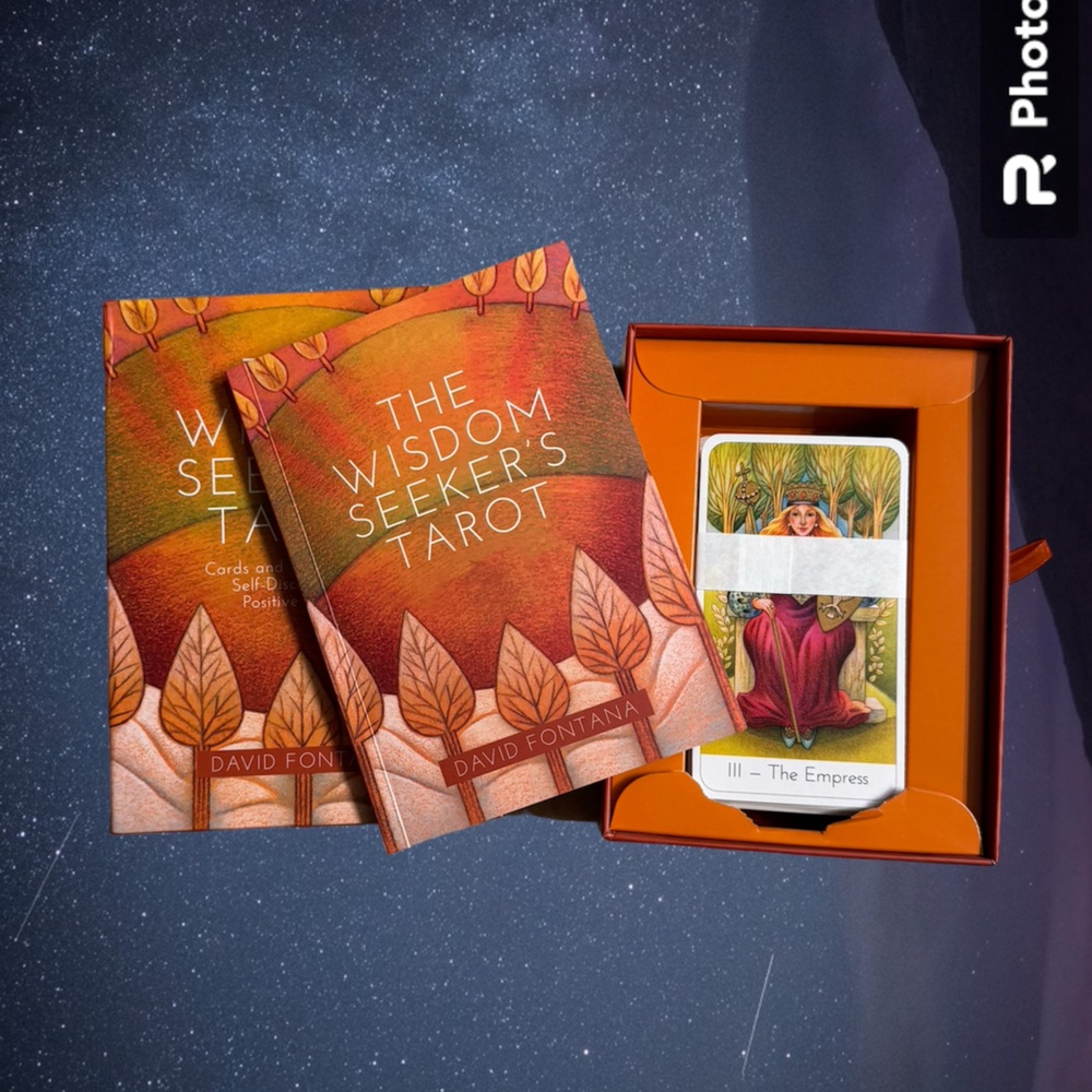 Tarot cards with book - wisdom seekers